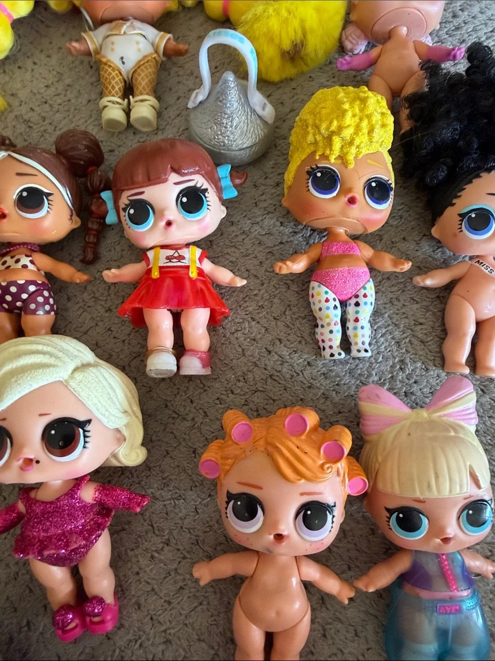 L.O.L. Surprise! Dolls Bundle with Pink, Yellow, Blue and Red Accents